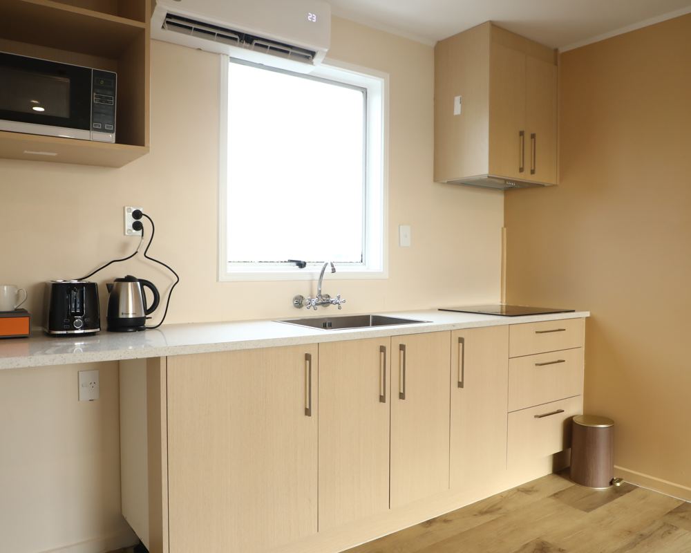 Fully equipped kitchenette with microwave, kettle and toaster